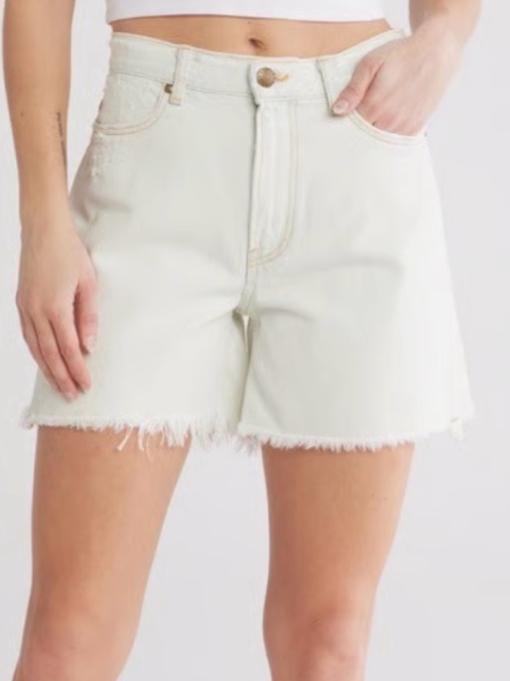 THE GREAT. High-Rise Frayed Hem Denim Shorts — Cream White